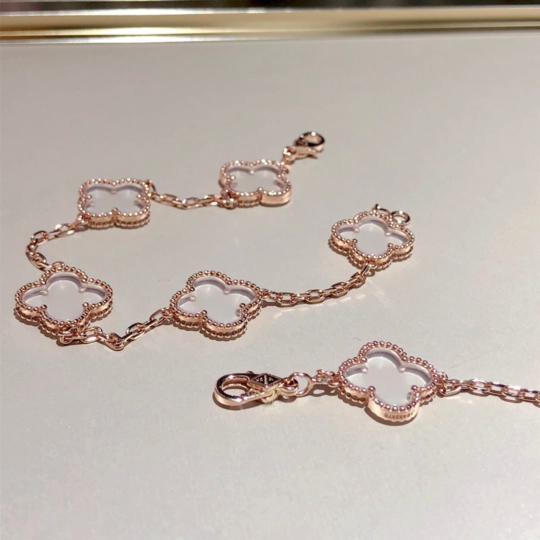 [TENDANCES]BRACELET EN OR ROSE ET CRISTAL DE ROCHE À 5 MOTIFS CLOVER