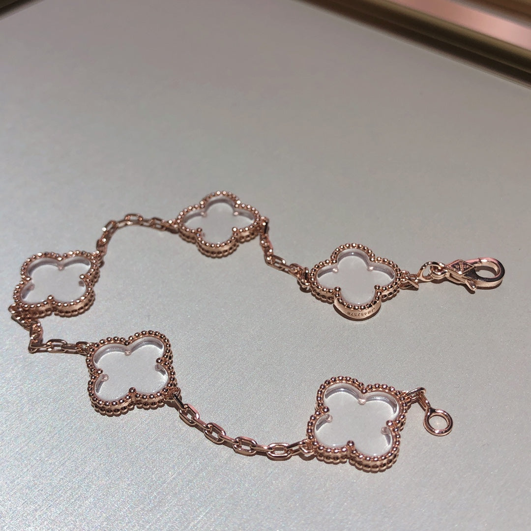 [TENDANCES]BRACELET EN OR ROSE ET CRISTAL DE ROCHE À 5 MOTIFS CLOVER