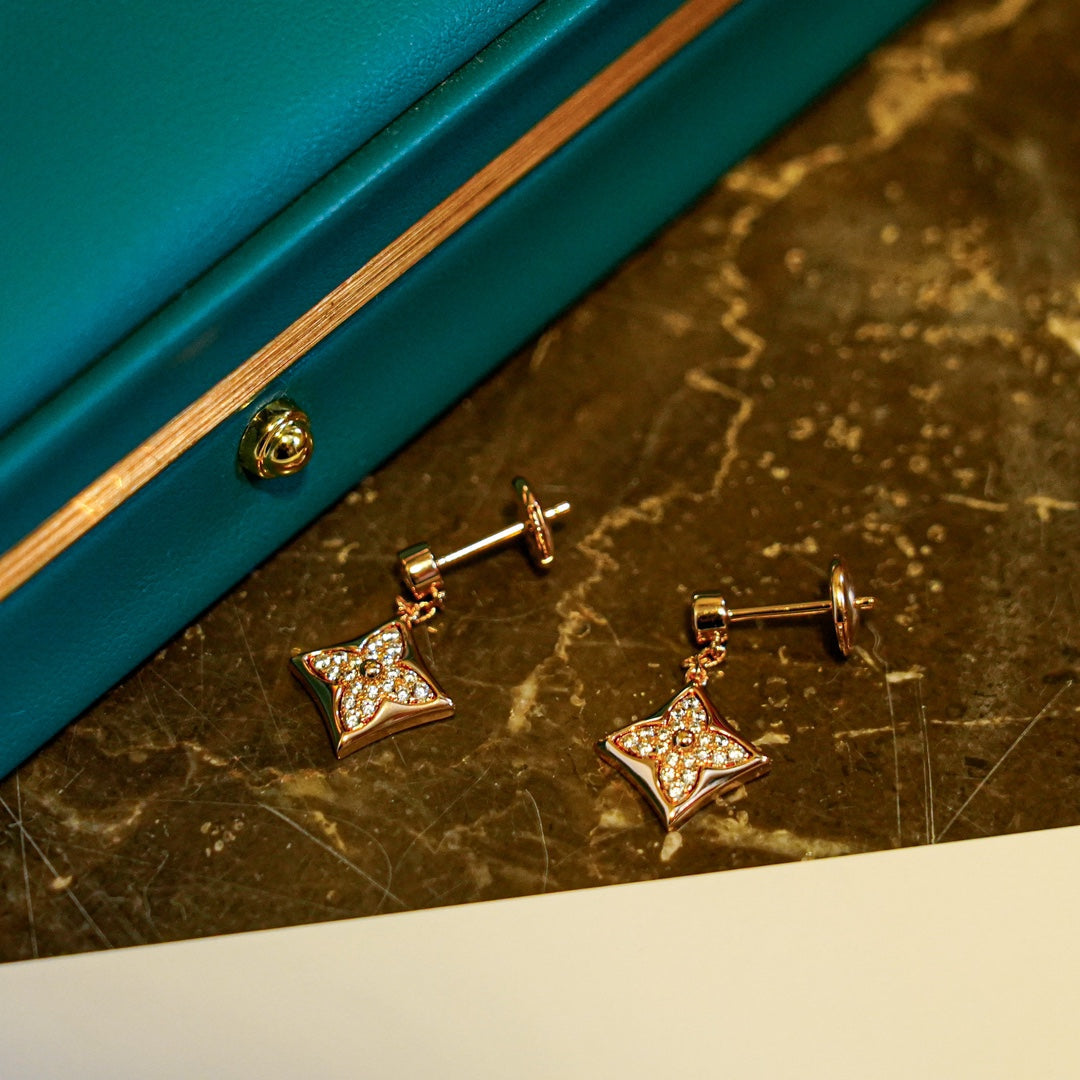 [TENDANCES]BOUCLES D'OREILLES STAR DIAMOND OR