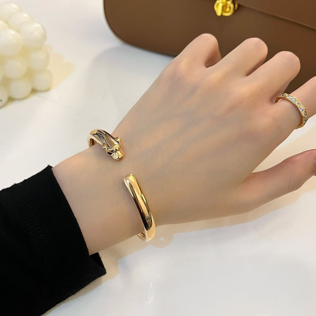 [TENDANCES]BRACELET OUVERT PANTHERE OR