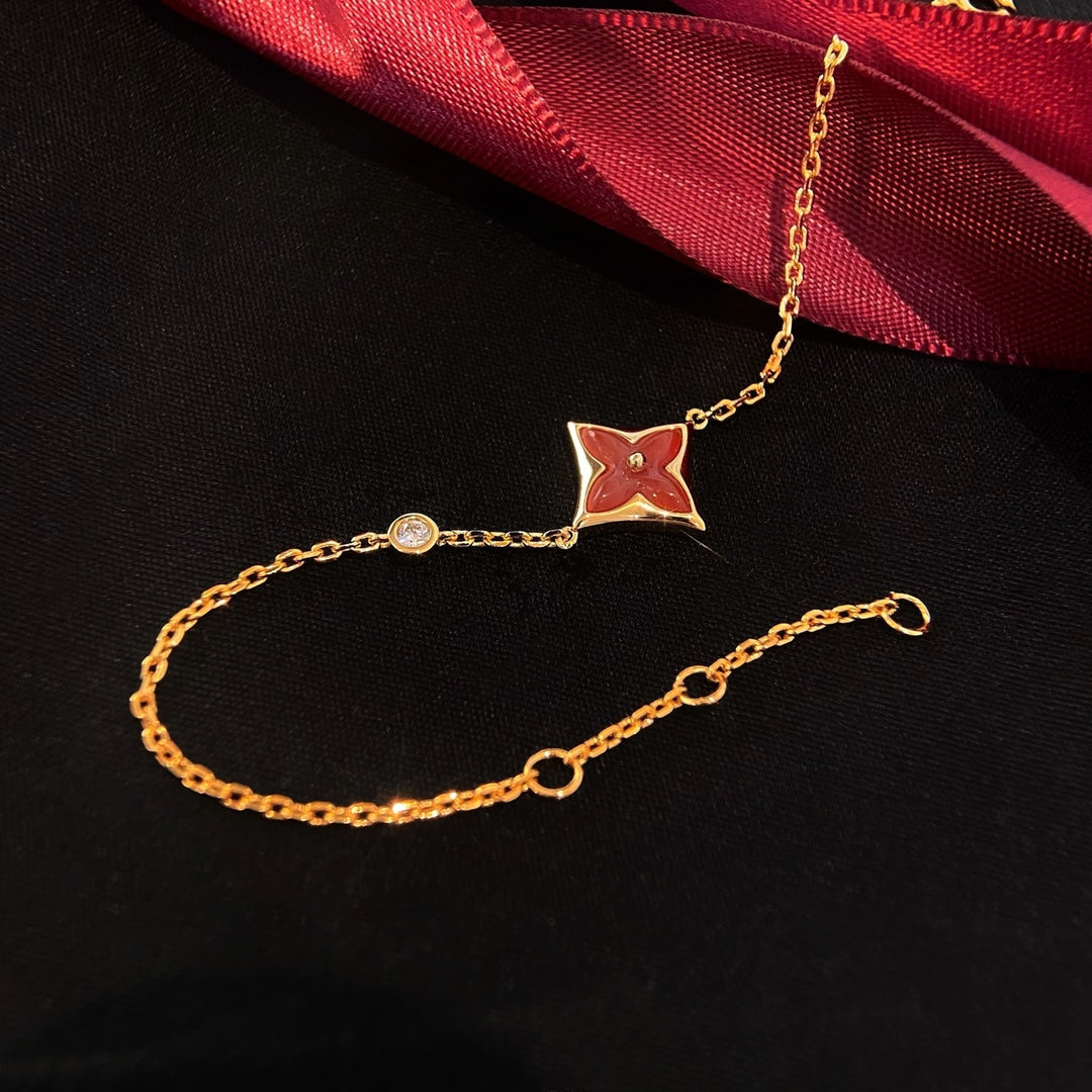 [TENDENCIAS]PULSERA DE ORO ROSA CON DIAMANTES Y CORNALINA COLOR ESTRELLA