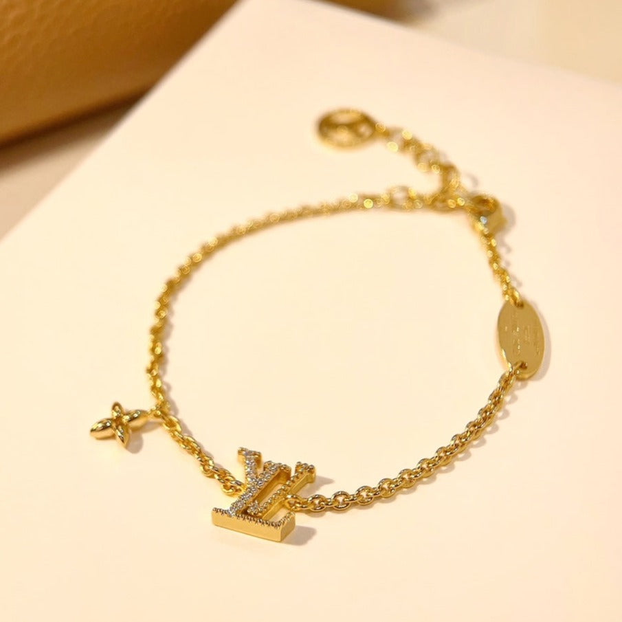 [TENDENCIAS] PULSERA ORO CON MOTIVO DE ESTRELLA Y LOGO