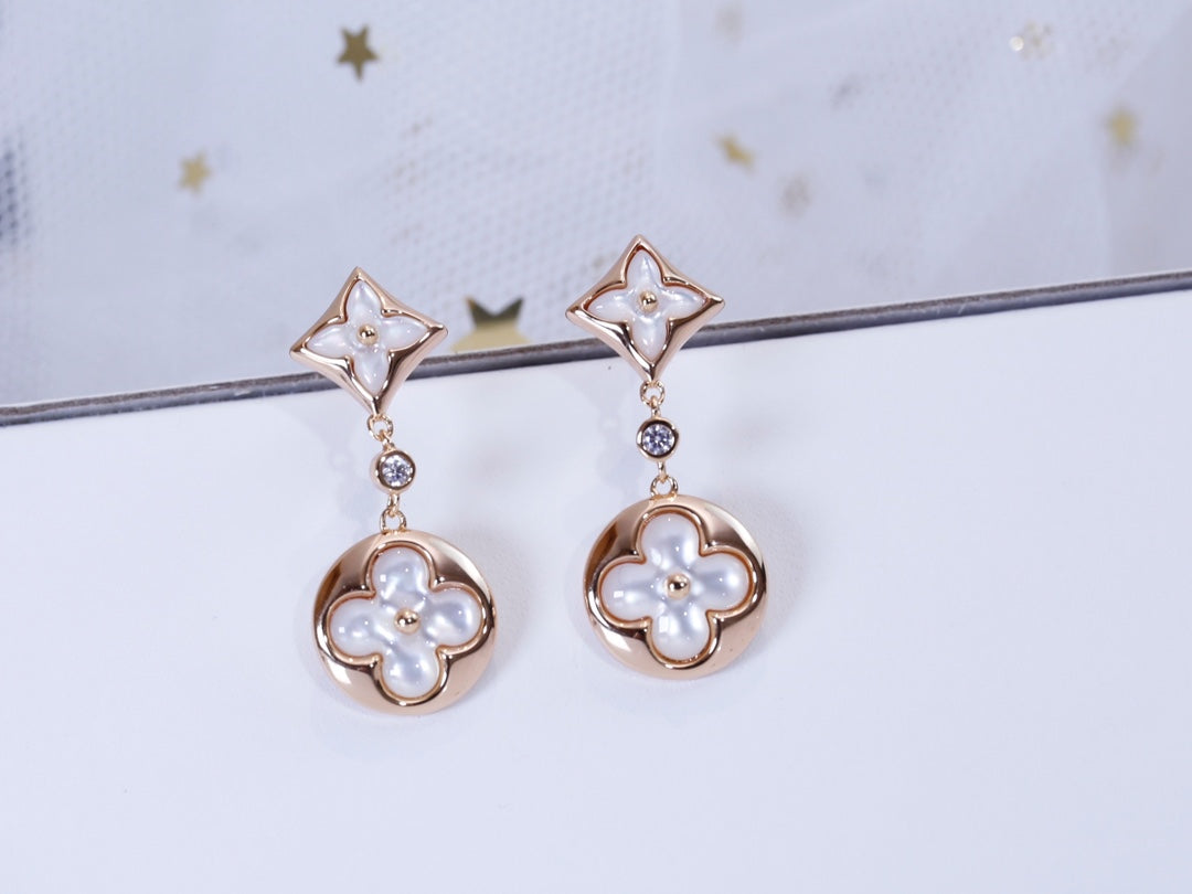 [TENDANCES]BOUCLES D'OREILLES PENDANTES EN OR ROSE STAR AND SUN