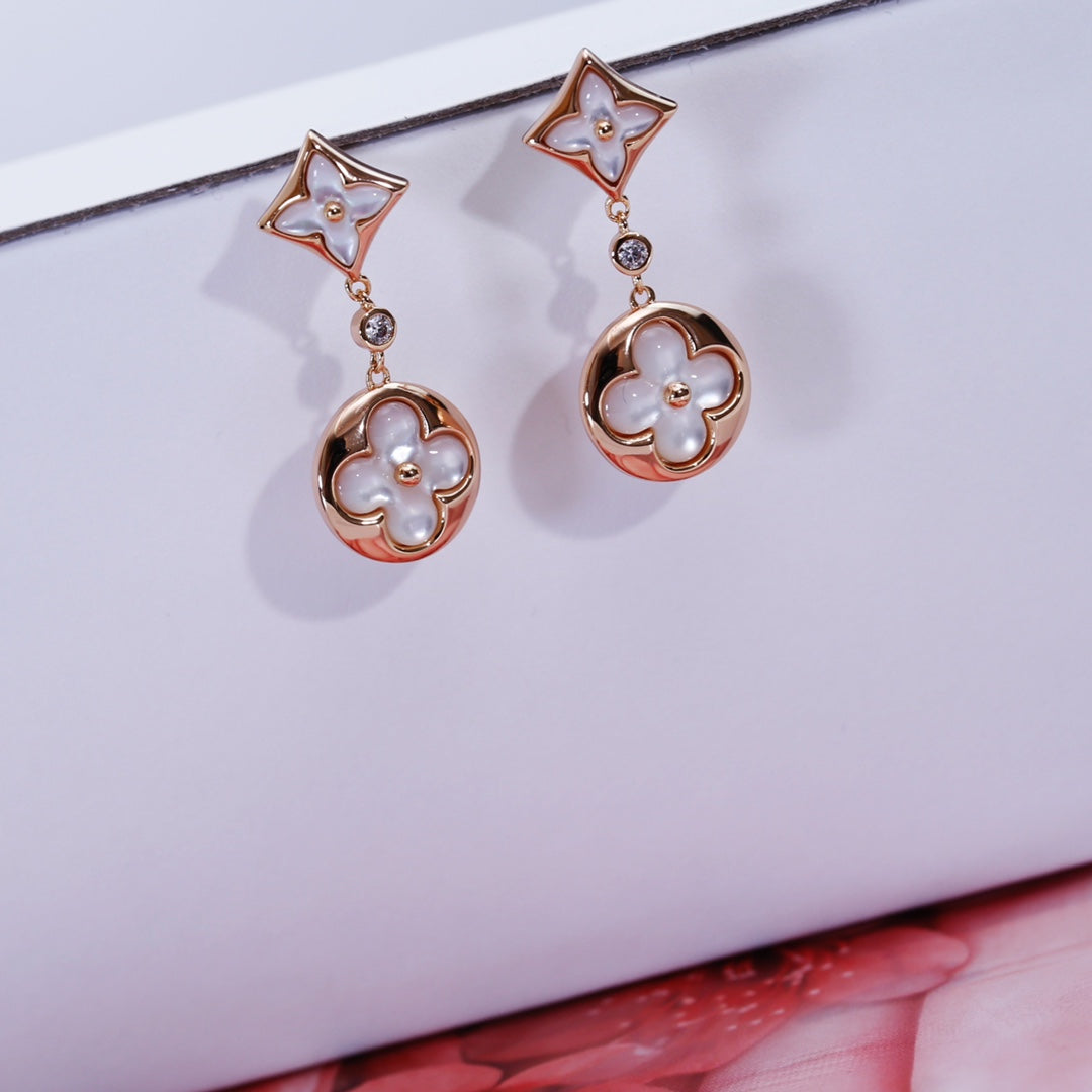 [TENDANCES]BOUCLES D'OREILLES PENDANTES EN OR ROSE STAR AND SUN