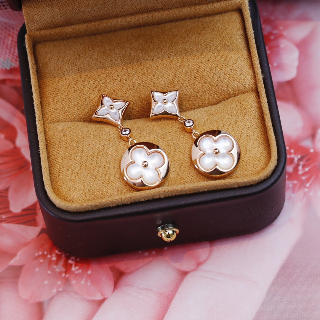 [TENDANCES]BOUCLES D'OREILLES PENDANTES EN OR ROSE STAR AND SUN