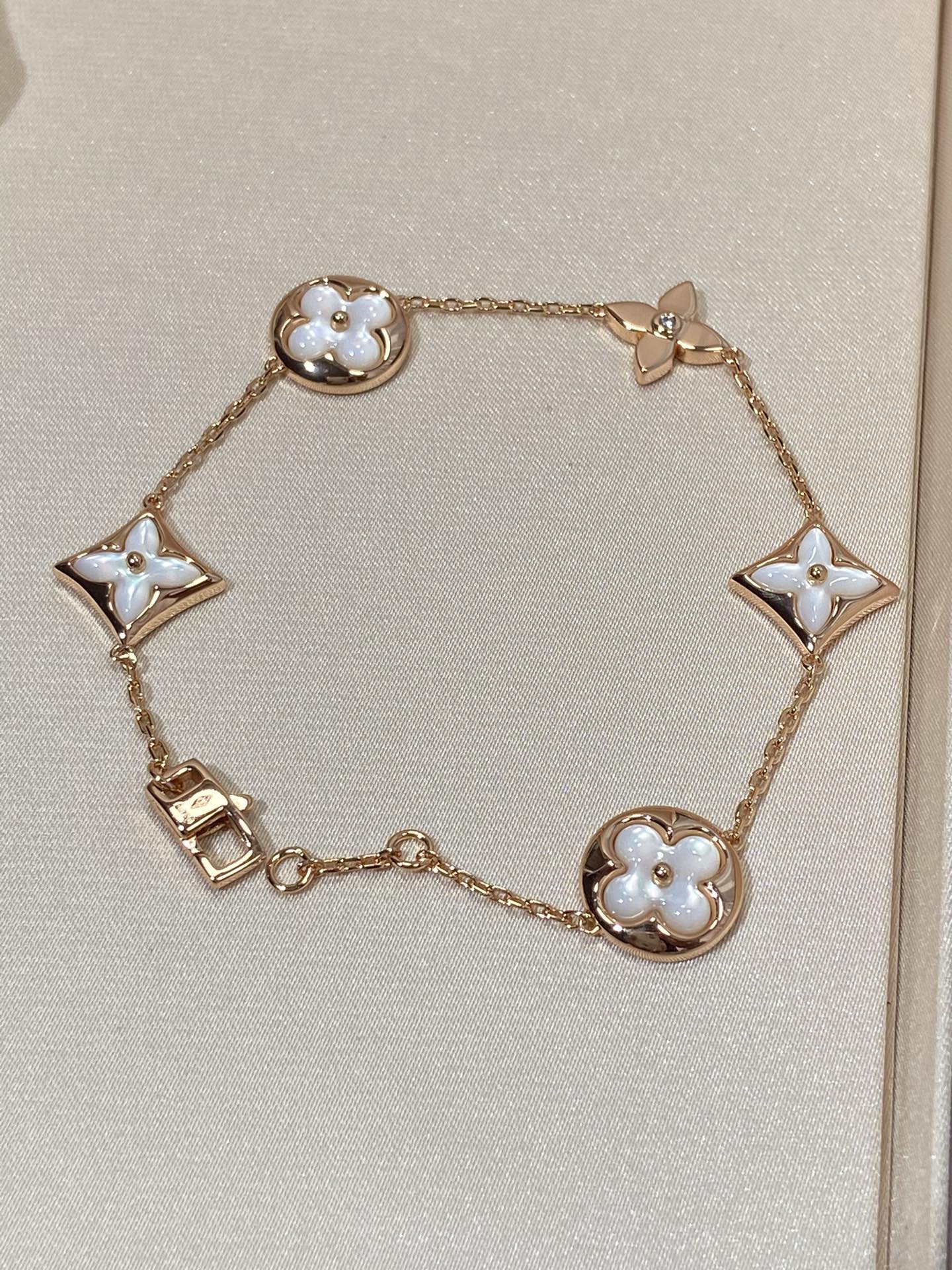 [TENDENCIAS] PULSERA DE ORO ROSA MOP CON 5 MOTIVOS DE ESTRELLAS Y SOLES