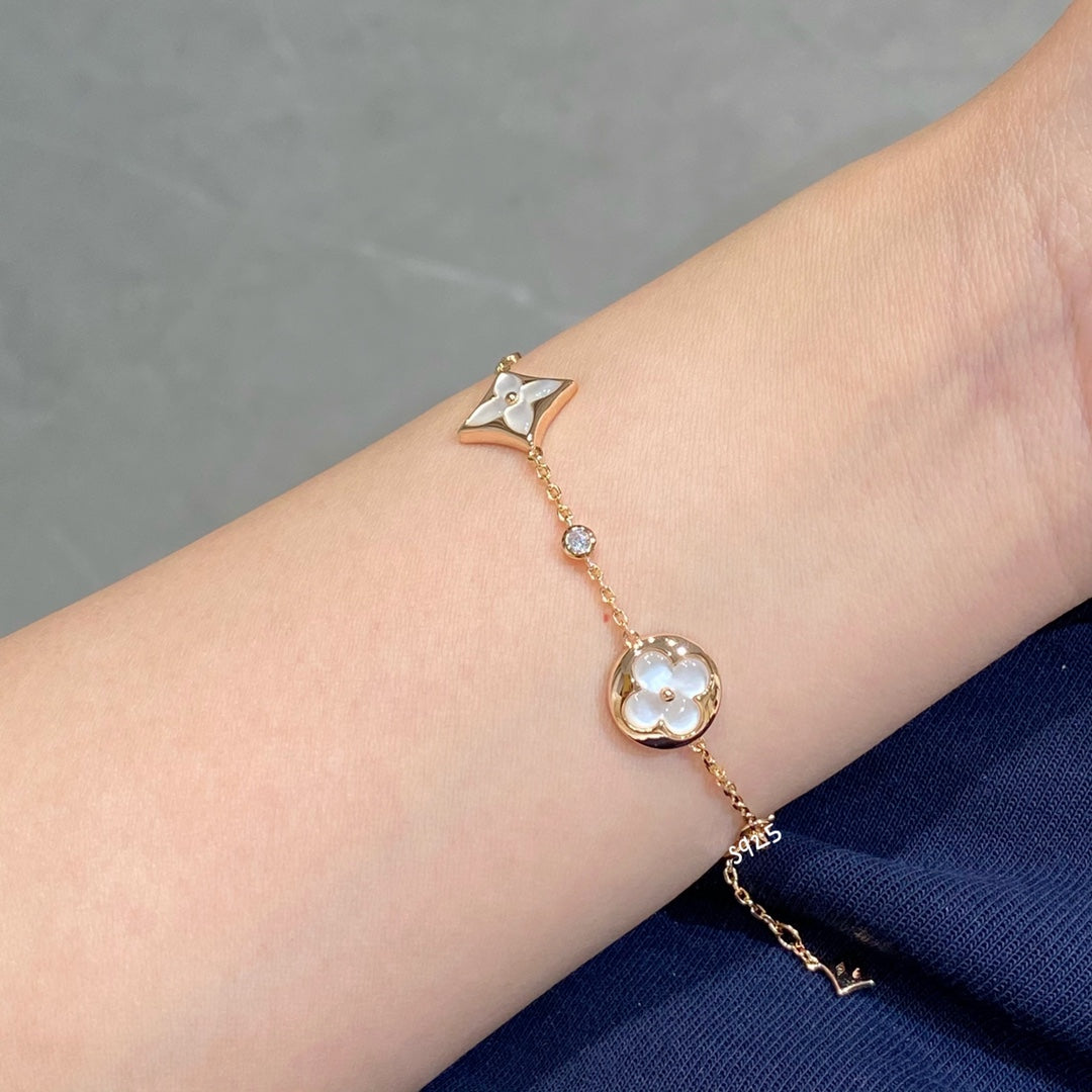 [TRENDS]STAR AND SUN 4 MOTIF WHITE MOP PINK GOLD BRACELET