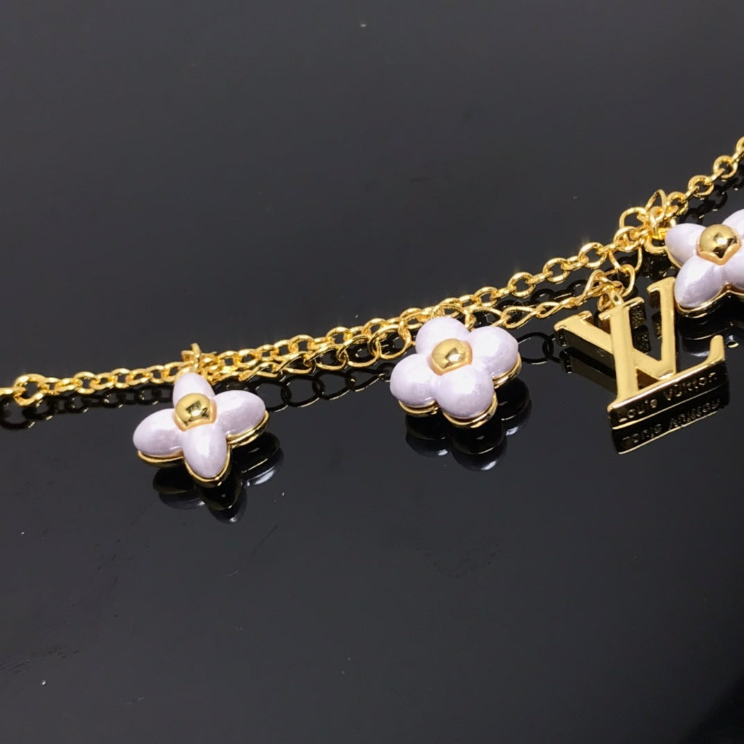 [TENDENCIAS] PULSERA ORO CON 6 MOTIVOS DE ESTRELLA Y SOL