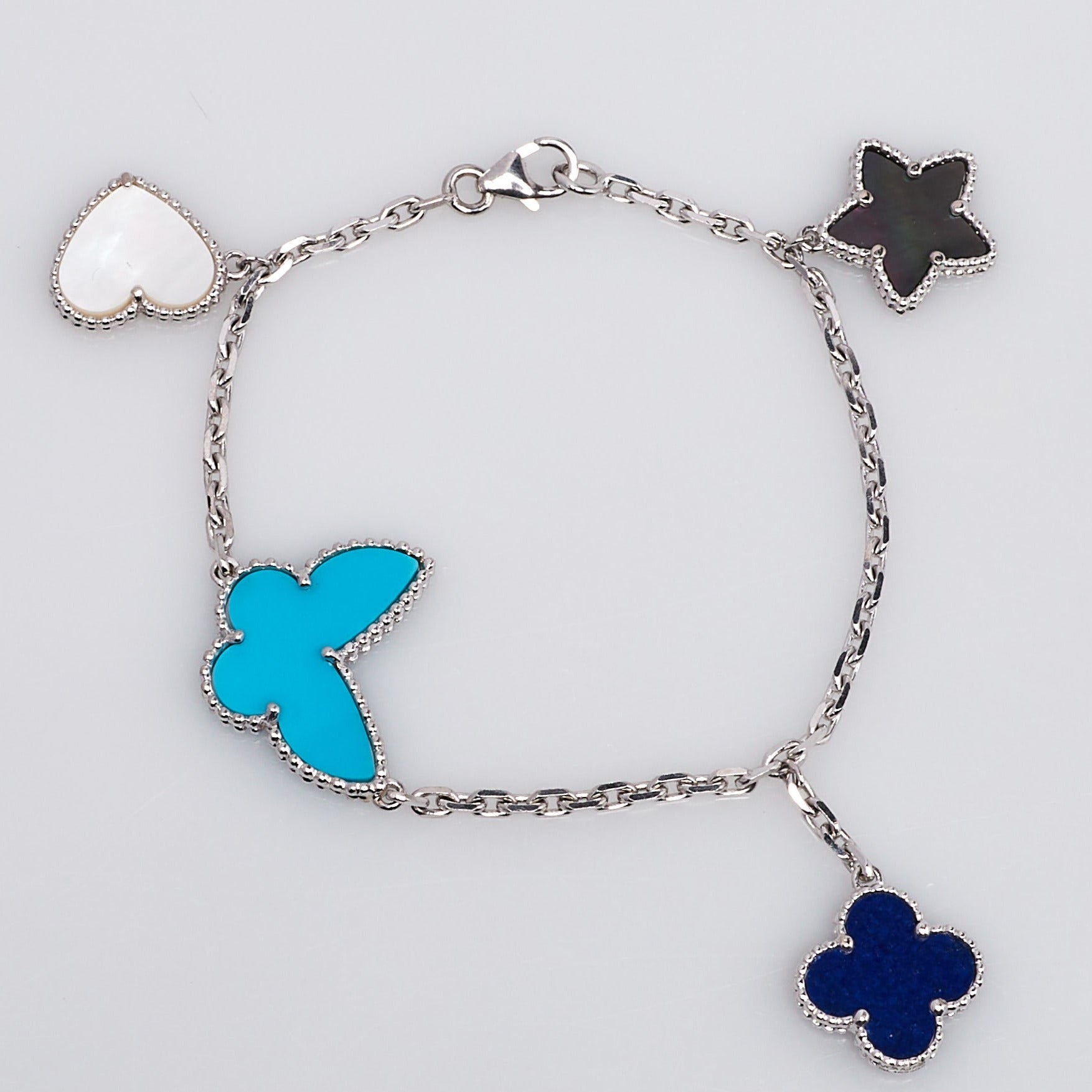 [TENDENCIAS]PULSERA LUCKY SPRING PLATA 4 MOTIVOS