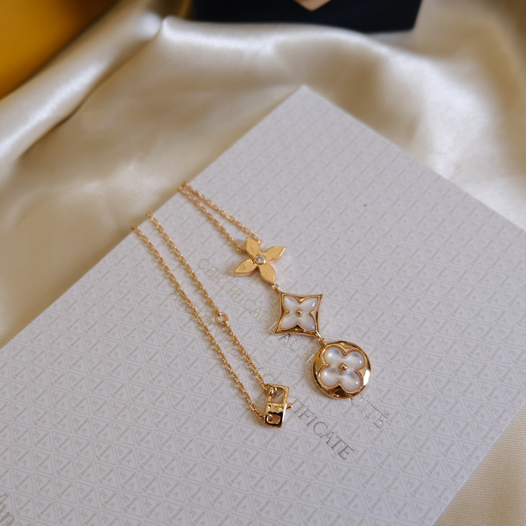 [TENDANCES] COLLIER LARIAT COLOR BLOSSOM OR ROSE NACRE BLANCHE ET DIAMANT